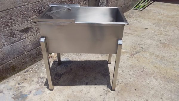 Mesa desoperculadora